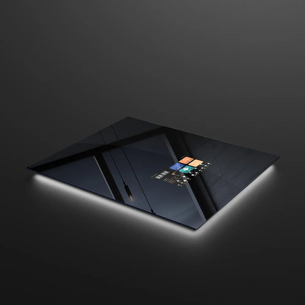 Sleek smart mirror with glowing edge lighting and touchscreen interface for modern luxury homes