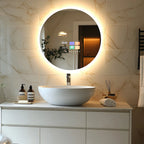 Aura Series Circle Smart Mirror with touch display in modern bathroom